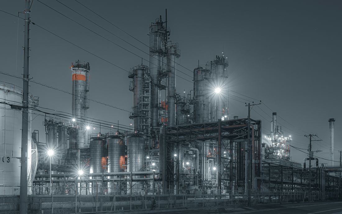 Refinery process facility at night